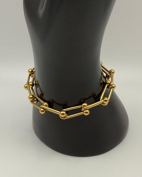 Pulsera de eslabones dorados