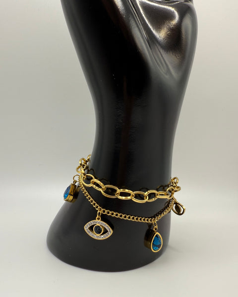 Pulsera con dije de mal de ojo apilado doble